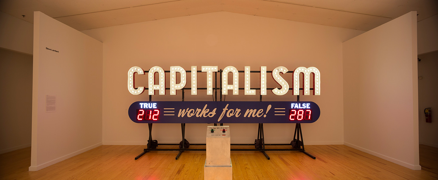 Steve Lambert, "Capitalism Works For Me! True/False", 2011, Aluminum and electrical